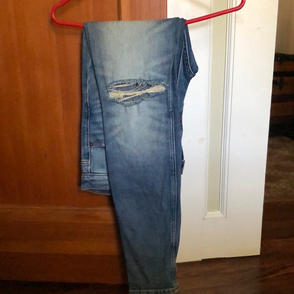 Fashion Nova Jeans with slight rips at the knee